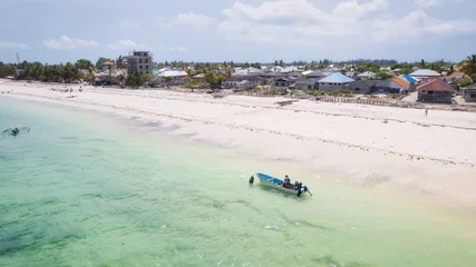 Cercles muraux Plage de Nungwi, Tanzanie The aerial view of the Zanzibar Island coast is a sight to behold, with its pristine beaches and turquoise waters.