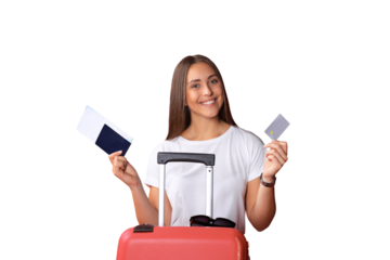 Tourist girl in summer showing plastic credit card, with sunglasses, red suitcase, passport isolated on red background.