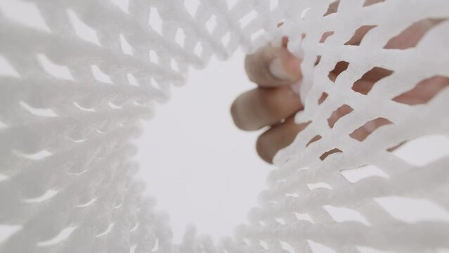 White foam net for wrapping fruit. Expanded polyethylene foam mesh for Fruit Wrap To prevent bumps.