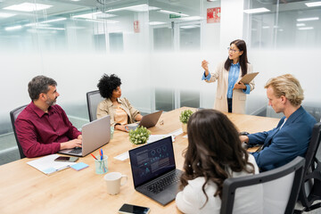 Businesspeople Working in Bright Workspace Office
