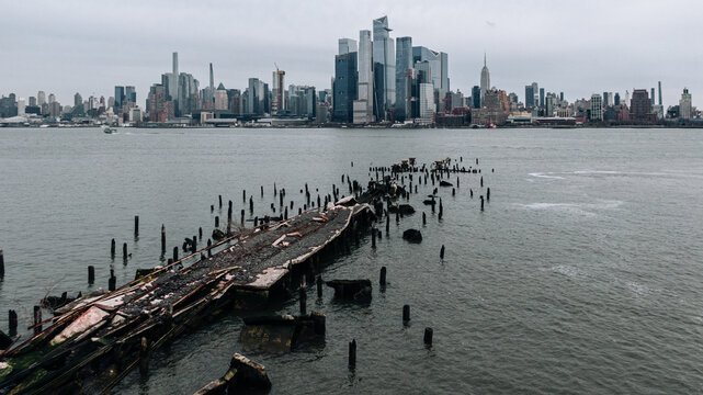 old destroyed bridge overlooking manhattan from `Hoboken