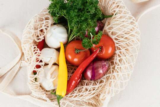 Vegetables in a mesh tote bag