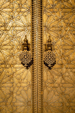 A golden door of a luxury building