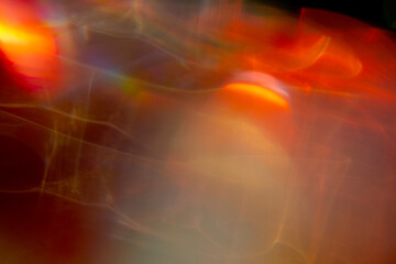 Orange glowing webs of iridescent light abstract