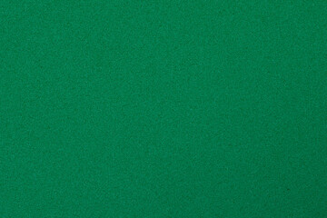 Plain foam sheet in green color. Solid background texture