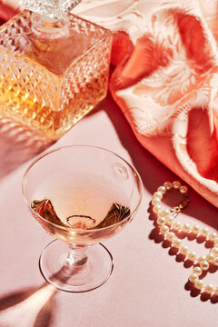 Single Glass of Aperitif with Decanter with Pearl Necklace 