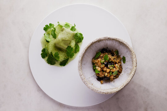 Green Curry cheek with Chaufa Rice on white table