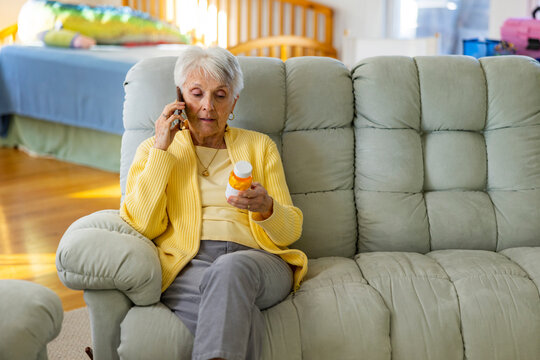 Senior Citizen on couch with prescription pill drug medication 