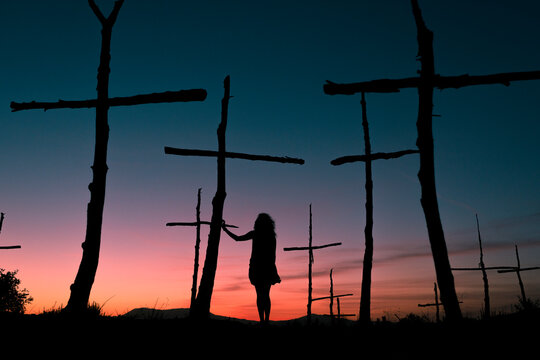 Woman silhouette feeling pain for dying nature - Powered by Adobe