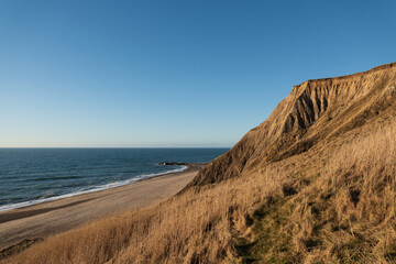 beach and dunes on steep coast in denmark