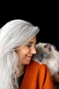 Mature woman with cat portrait