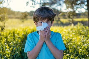 Little Boy Is Blowing Her Nose. Allergy Concept