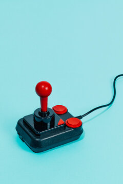 wired black and red joystick