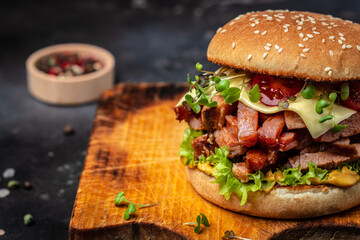 home made tasty burger with grilled beef meat fast food and junk food concept