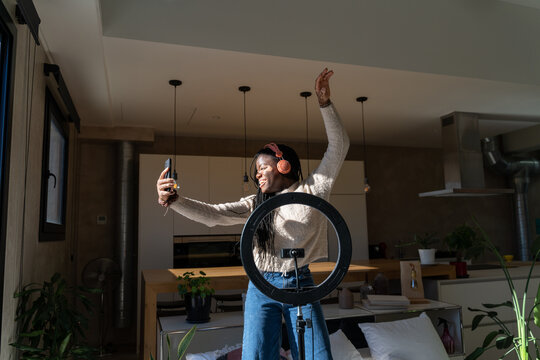 Dancing woman with phone