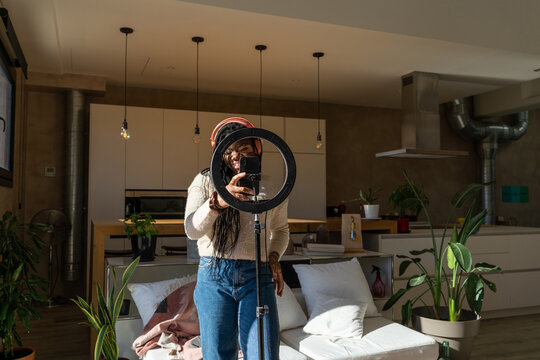Woman dancing and recording videos for tik tok