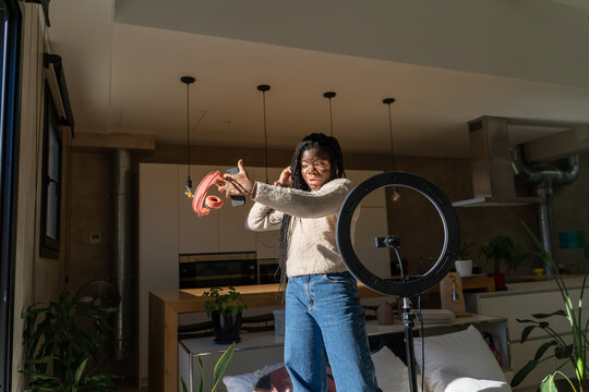 Woman dancing and recording videos for tik tok