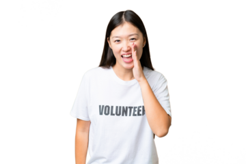Young volunteer woman over isolated chroma key background shouting with mouth wide open