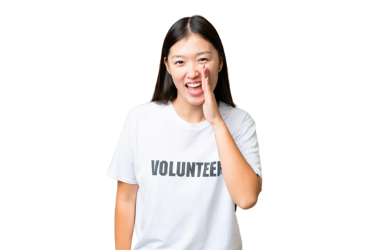 Young volunteer woman over isolated chroma key background shouting with mouth wide open