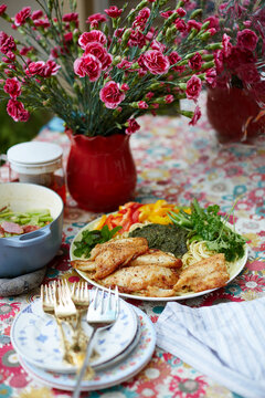 Homemade food, pasta with cod and vegetables pesto