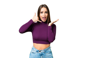 Obraz premium Young beautiful woman over isolated chroma key background making phone gesture and doubting