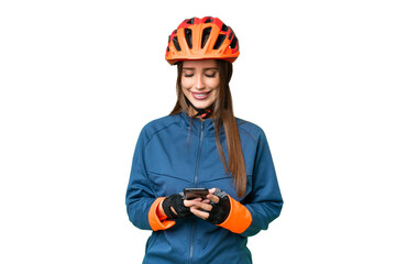 Young cyclist woman over isolated chroma key background sending a message with the mobile - obrazy, fototapety, plakaty
