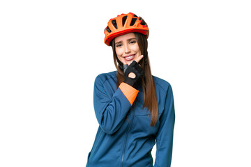 Young cyclist woman over isolated chroma key background smiling - obrazy, fototapety, plakaty