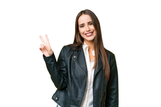 Young beautiful woman over isolated chroma key background smiling and showing victory sign