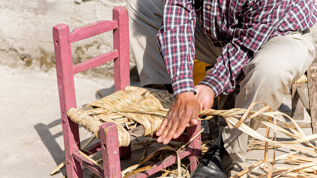 Hands Of A Mexican Artisan Chair Weaver
