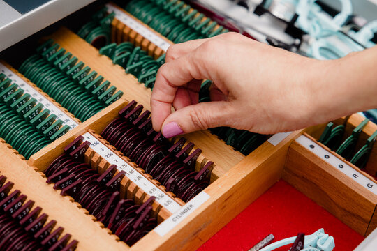 Oculist choosing trial lens