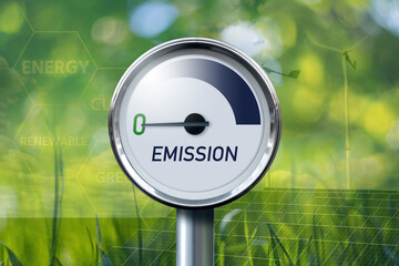 Gauge with inscription EMISSION. Arrow points to zero. Concept of green energy.	