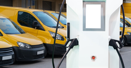 Electric delivery vans with electric vehicles charging station.	