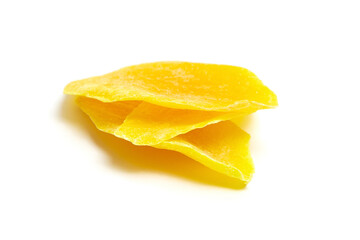 Candied mango fruit slices isolated on white background. Dried mango slices