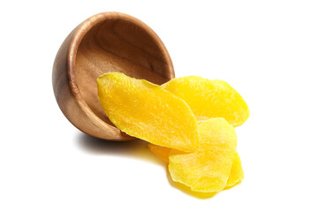 Candied mango fruits slices in wooden bowl isolated on white background. Dried mango slices