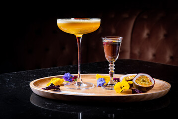 Glass of porn star martini cocktail on dark background