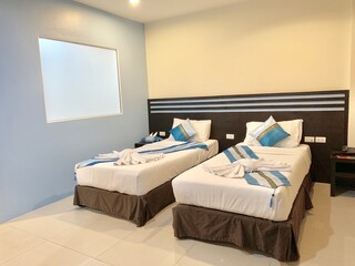 Hotel Room Decorated single bedroom with bed nice colours