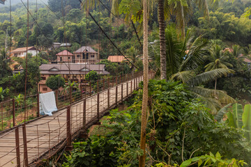Suspension foot bridge in Muang Khua town, Laos