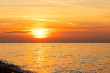 Naklejka na ściany i meble sunset on the sea, natural landscape, evening on the seashore