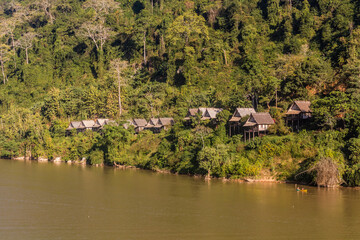 Fototapeta na wymiar Houses in Nong Khiaw viewed from Nam Ou river, Laos