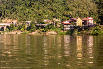Fototapeta na wymiar Riverside houses in Nong Khiaw, Laos