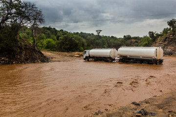 Truck stuck in swollen waters of Kizo river, Ethiopia