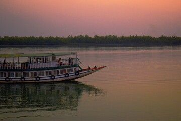 Obraz premium Beauty of Sundarban Boats at twilight