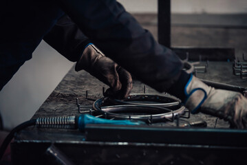 Close up of the steel welding process. Work in the heavy steel industry