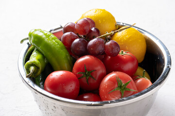 fresh vegetables and fruits in bowl .