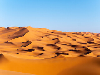 Fototapeta na wymiar Stunning sand dunes near Merzouga, Morocco during sunset - Landscape shot 6