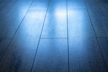 Floor panels background. old brown wooden floor diagonally. new hardwood floor