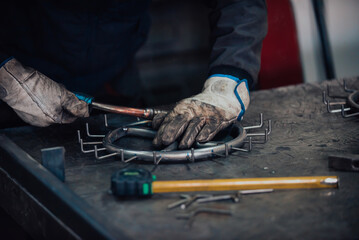 Close up of the steel welding process. Work in the heavy steel industry