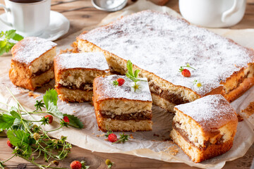 Apple pie, sponge cake, Charlotte with apples on a table