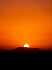 Fototapeta na wymiar Stunning desert sunset around Merzouga, Morocco - Portrait shot