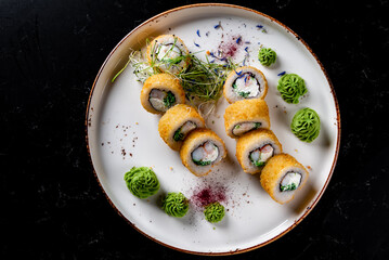 set of sushi roll in plate